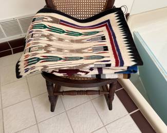 Various textile souvenir blankets and wall hangings