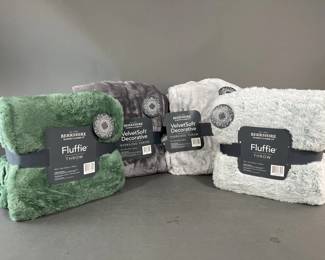 Lot 47 | 2 Berkshire VelvetSoft Throws & 2 Fluffie Throws
