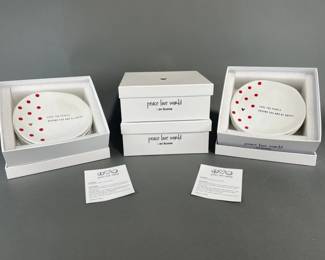 Lot 45 | 16 Piece Peace and Love Plate Set
