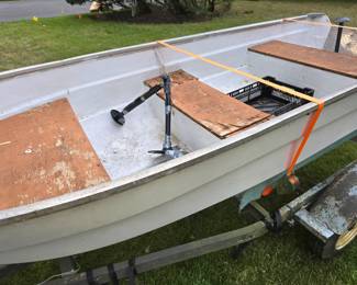 Fishing boat with trailer.