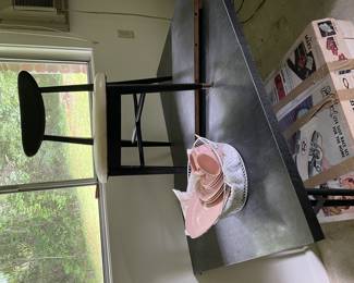 Pic is  n its side. Having trouble downloading. It’s a mcm table that’s n the apartment room (the uncles area). He owned sandwich shop and liquor store back when.   Toy racetrack in box below 