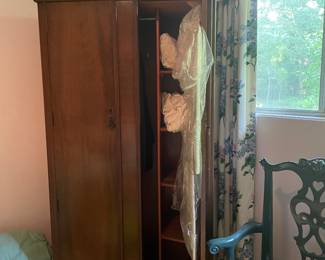 Small pretty wardrobe in good shape. Hang on one side and shelves on other.   The Chippendale chair has a lacquered finish in a beautiful deep teal 