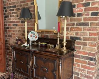 Perfect antique foyer piece. English oak server. Barely twist front legs.  Beautiful Carolina quality traditional mirror. Lamps work perfect 