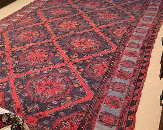 Handwoven and large. measures 12 ft 6 in. By 9 wide 