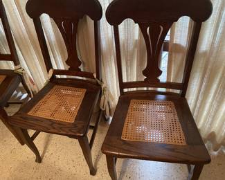 Antique Cane bottom chairs. Six total. One arm chair 