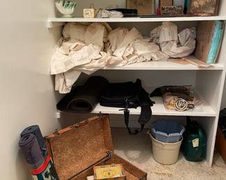 More. There is old luggage here. Also there are two tall metal file cabinets 