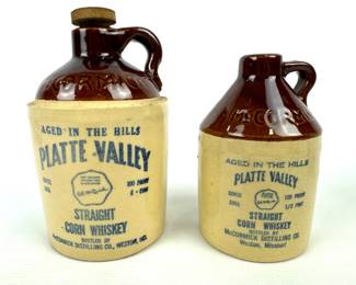 #223 • McCormick Platte Valley Corn Whiskey Jugs - 2 Sizes
