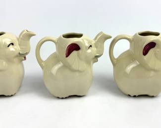 #256 • Three Shawnee Pottery Elephant Creamer Pitchers
