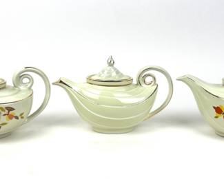 #261 • Hall's Superior Ivory And Gold Aladdin Style Tea Pots (3)

