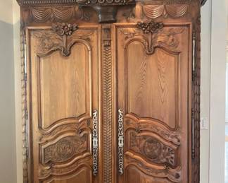 Absolutely gorgeous 8.5’ historical, ornate, hand-carved, Covered Wagon (mid to late 1800s - year of 1839) armoire that comes apart in at least 4 pieces (piece was purchased by current owner from the Sabates family)