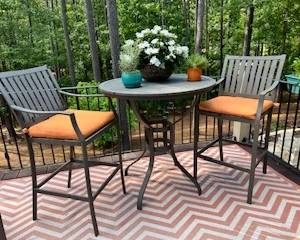 Woodard Bistro Table and chairs, black metal and orange upholstered cushions (and you can buy the plants too if you really want them)