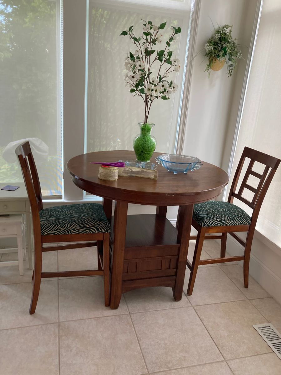 pub table with 2 chairs