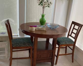 pub table with 2 chairs