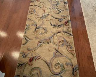 there are 3 of these runners and a large round entry way rug that also matches