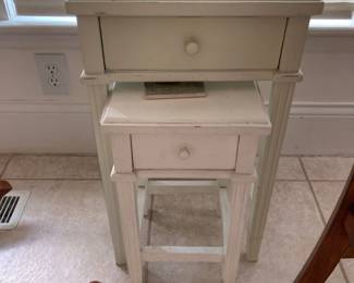 couple small nesting tables