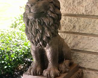 Several concrete lion statues