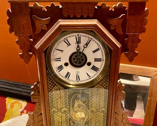 Carved mantle clock