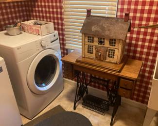 NEWER WOOD HOUSE.  ANTIQUE SEWING MACHINE