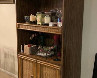 Wood standing shelf with wicker accent