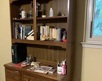 Wood desk with attached bookshelf