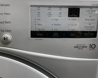 LG Front-Load Washer Washing machine with storage drawer at the base, less than one year old. 