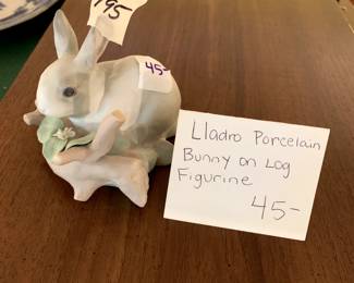 #195	Lladro porcelain bunny on log figurine	 $45.00 
