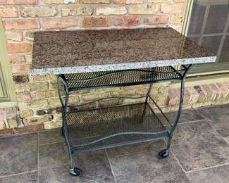 #152	Grought Wrought iron Tea cart on Wheels w/granite Top - 35x20x31	 $100.00 

