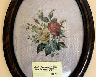 #202	oval framed floral needle point Tan 17x23	 $50.00 

