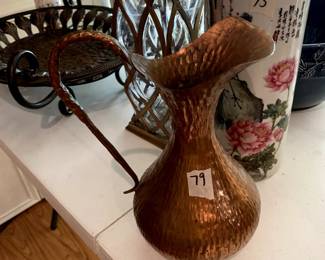 #79	Copper Pitcher (057 on bottom) 9" Hammered	 $30.00 
