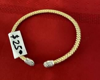 #217	Sterling silver tip gold plated bracelet from Donny's diamond store 	 $25.00 			
