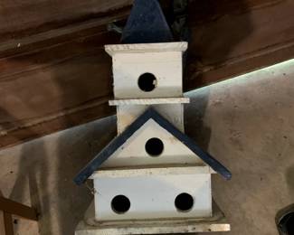 #107	Wood Bird House w/4 apartments - 27" Tall	 $30.00 
