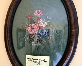 #203	oval framed floral needle point green 17x23	 $50.00 

