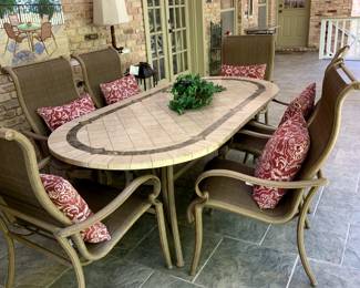 #147	Oval Tile Table w/6 Sumbrella Sling Chairs 42x83 w/6 chairs - You will need your own help to move	 $300.00 
