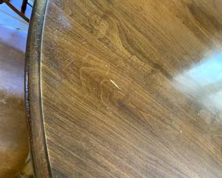 #4	laminate top round table with QA legs with 2 leaves and 6 spindle chairs 54-x54x39 as is top. 	 $180.00 

