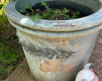 Several large concrete pots