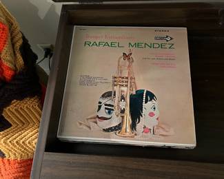 To go along with the turntable there is a collection of LPs available in the sale.