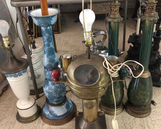 Many lamps. Check out that brass scuba lamp and the pair of green and brass lamps.  