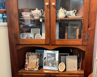Antique corner cabinet, porcelain, frames, interesting golf tee frames, American glass