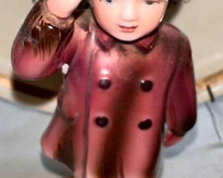 John John Kennedy saluting the casket carrying his father JFK after his assasination