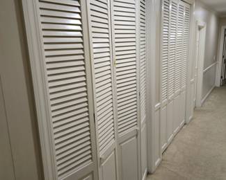 Louvered Closet doors, solid wood
Each hinged set is 29 3/4"×93" (4 avail.)