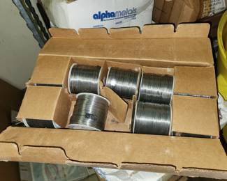 dozens of boxes of brand new lead solder.  1 & 5 lb rolls