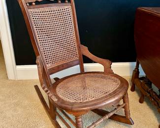 antique cane-back ladies sewing rocker