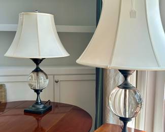 pair of matching glass globe
lamps