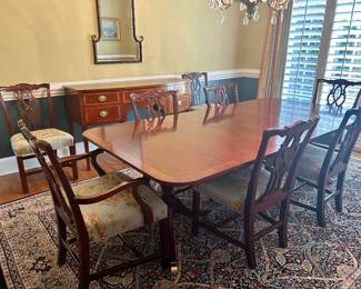 Double pedestal dining table with 8 chairs (rug, not for sale) Table measures 47” wide by 92” (as pictured with two 12” leaves)