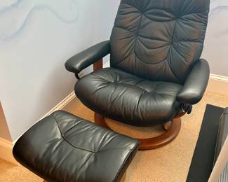 “Stressless” Ekornes black leather chair & foot stool