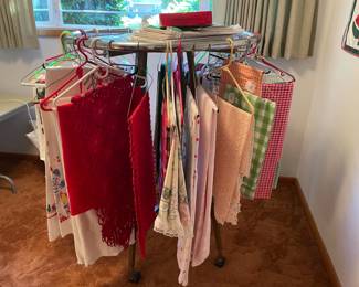 tablecloths, bedding, emboidery, quilts, lace, ribbon, blankets, coverlets.