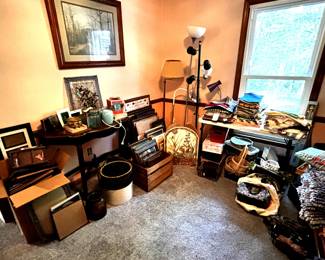 Large selection of photo frames, pictures/home decor, floor lamps, baskets, table runners/placemats and table cloths.