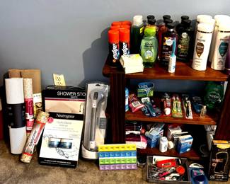 Bathroom and personal care supplies, many unopened and in original packaging.