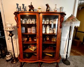 Antiques and collectables including canister sets and train car liquor dispensers. 