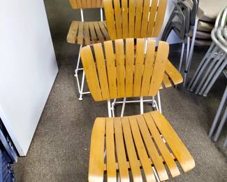 We are selling these three steel and wood swivel chairs as a lot of three. They are very comfortable and solid and measure 17 3/4" wide, 34" tall, 19" deep, with a 20" seat height. 